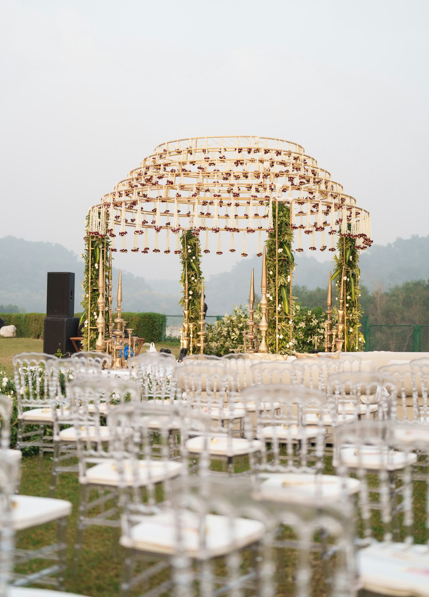 Outdoor wedding ceremony setup with elegant seating arrangements